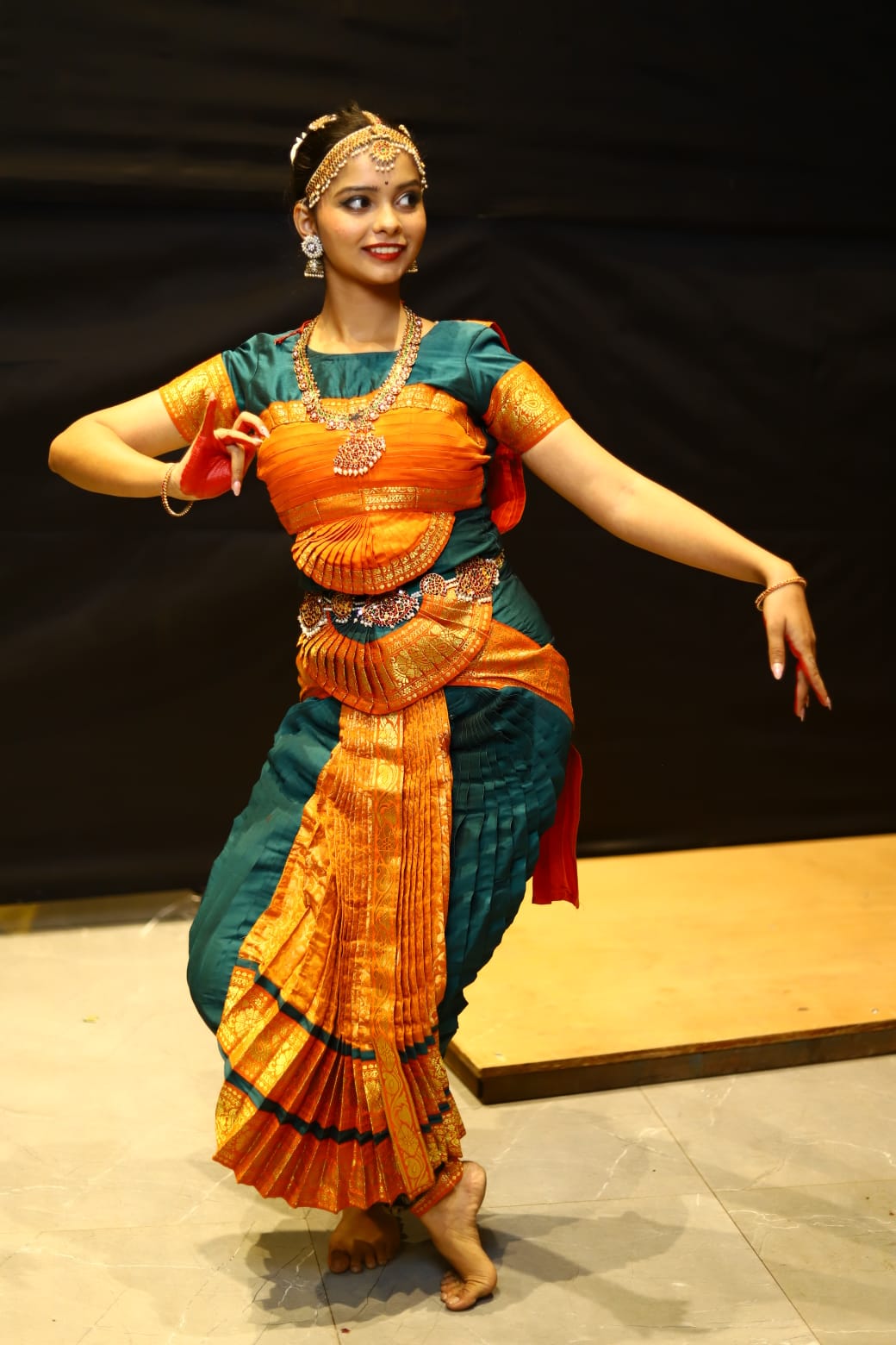 Shuchi performing Bharatanatyam in traditional costume