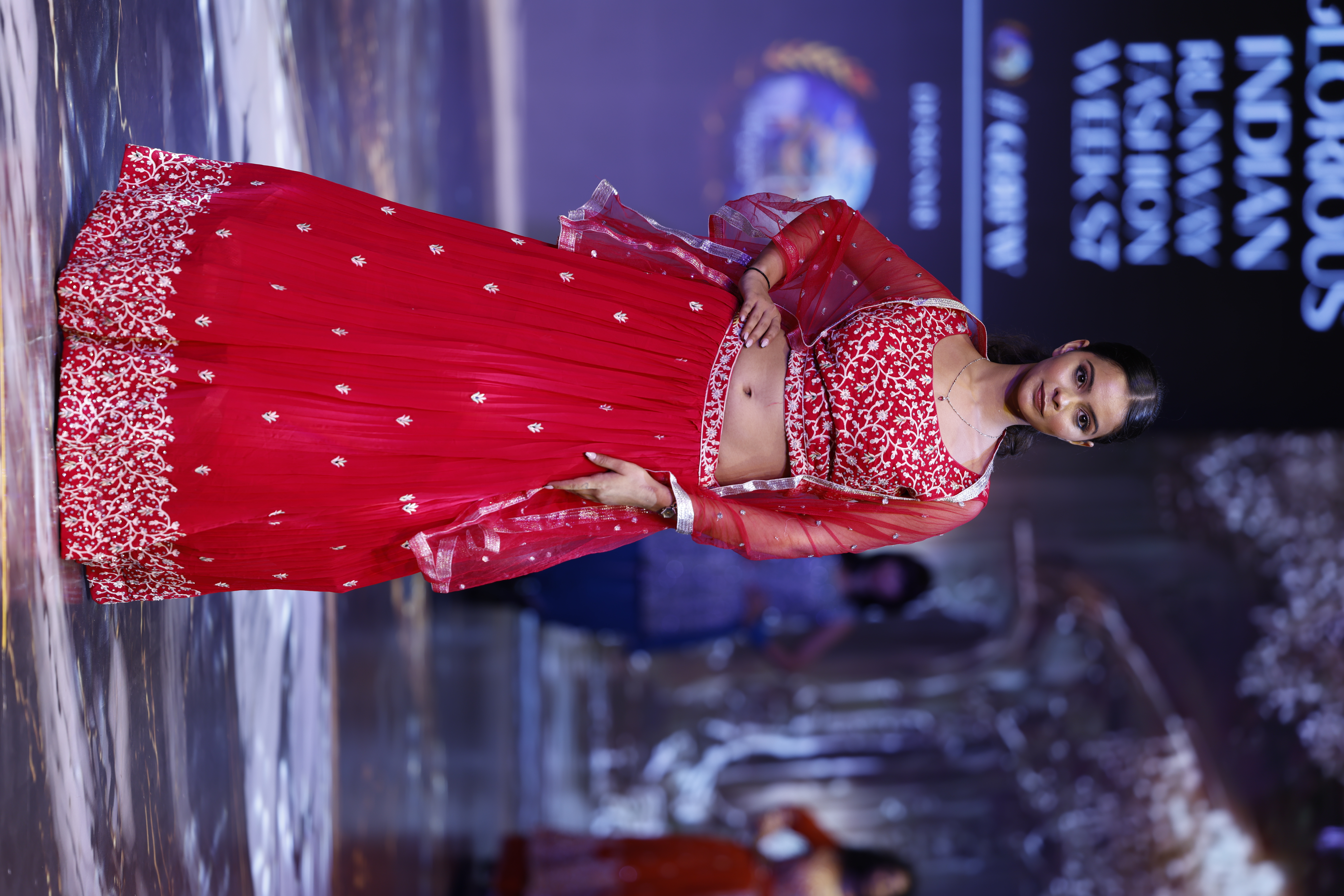 Shuchi ramp walk gold lehenga front pose